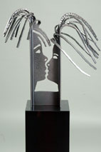 Face 2 Face sculpture by metal sculptor craig brown, original welded metal sculpture and furniture